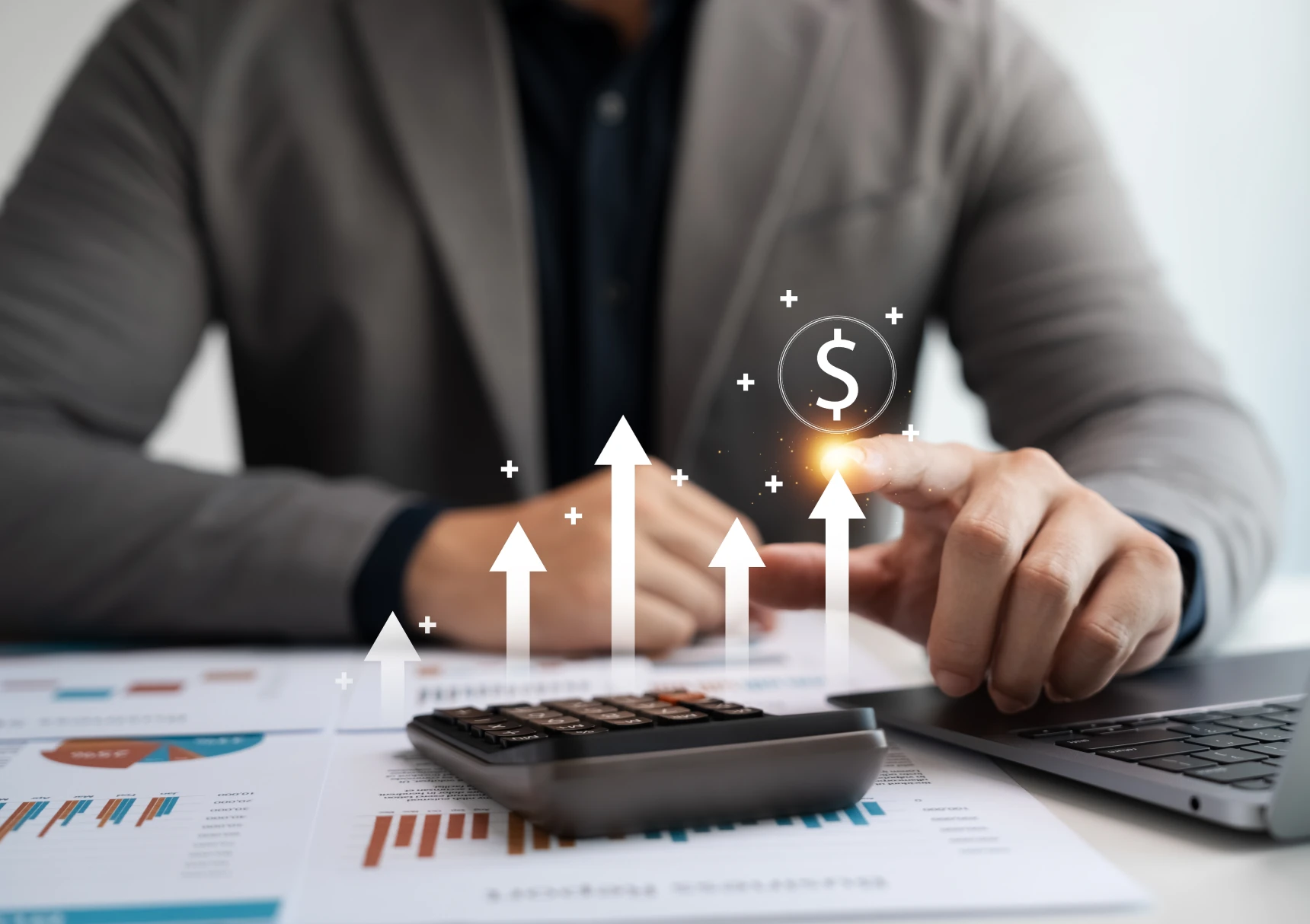 Person using calculator with growth arrows